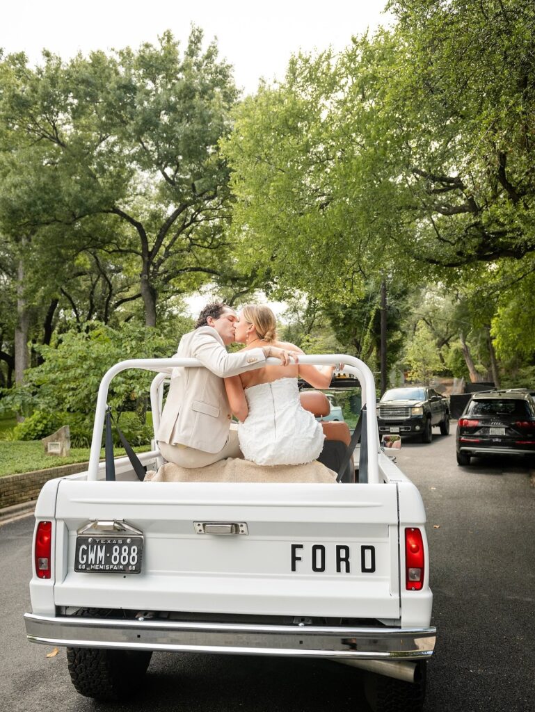 An iconic getaway shot by allie.goodspeed.photo! 📸 •⁠ •⁠ Wed Society | Austin FEATURED vendors:⁠ Photographer: allie.goodspeed.photo⁠ Planner: pearleventsaustin⁠ •⁠